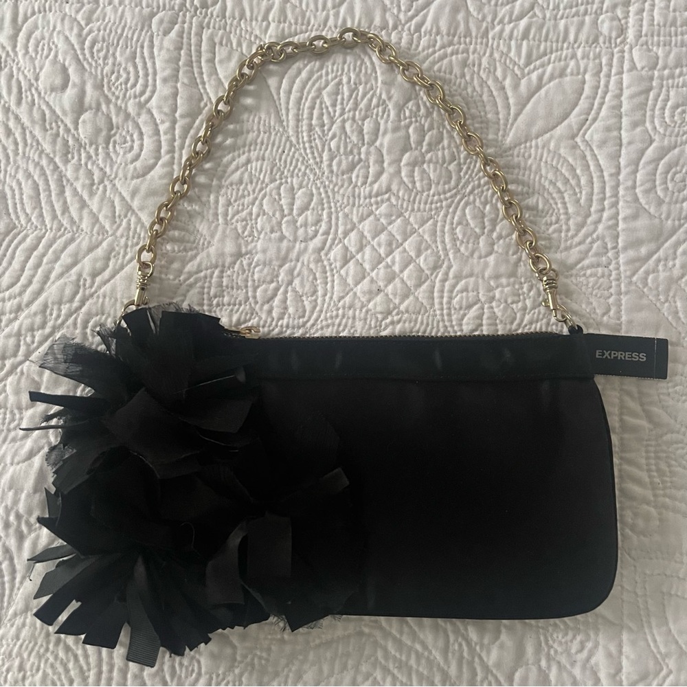 Mini purse. Brand New with tags! Jet black with removable gold strap! NWT!